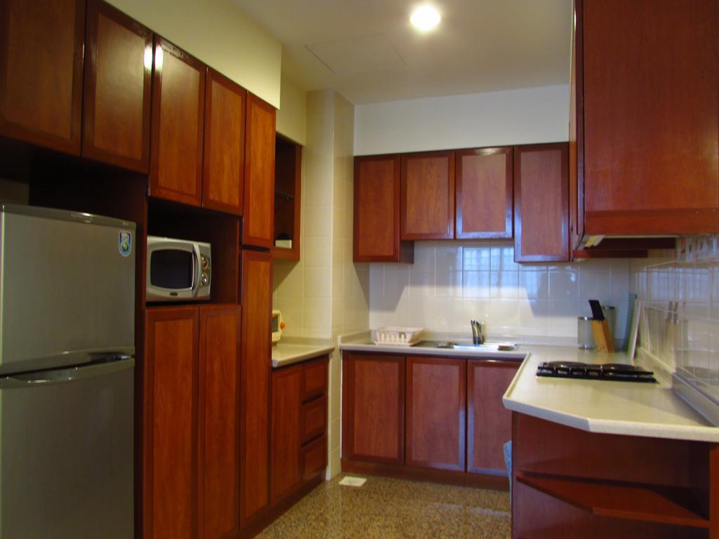 Alocassia Serviced Apartments Szingapúr Szoba fotó
