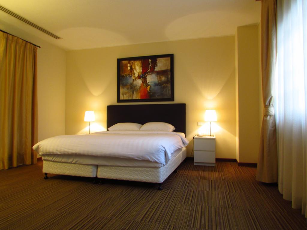 Alocassia Serviced Apartments Szingapúr Szoba fotó