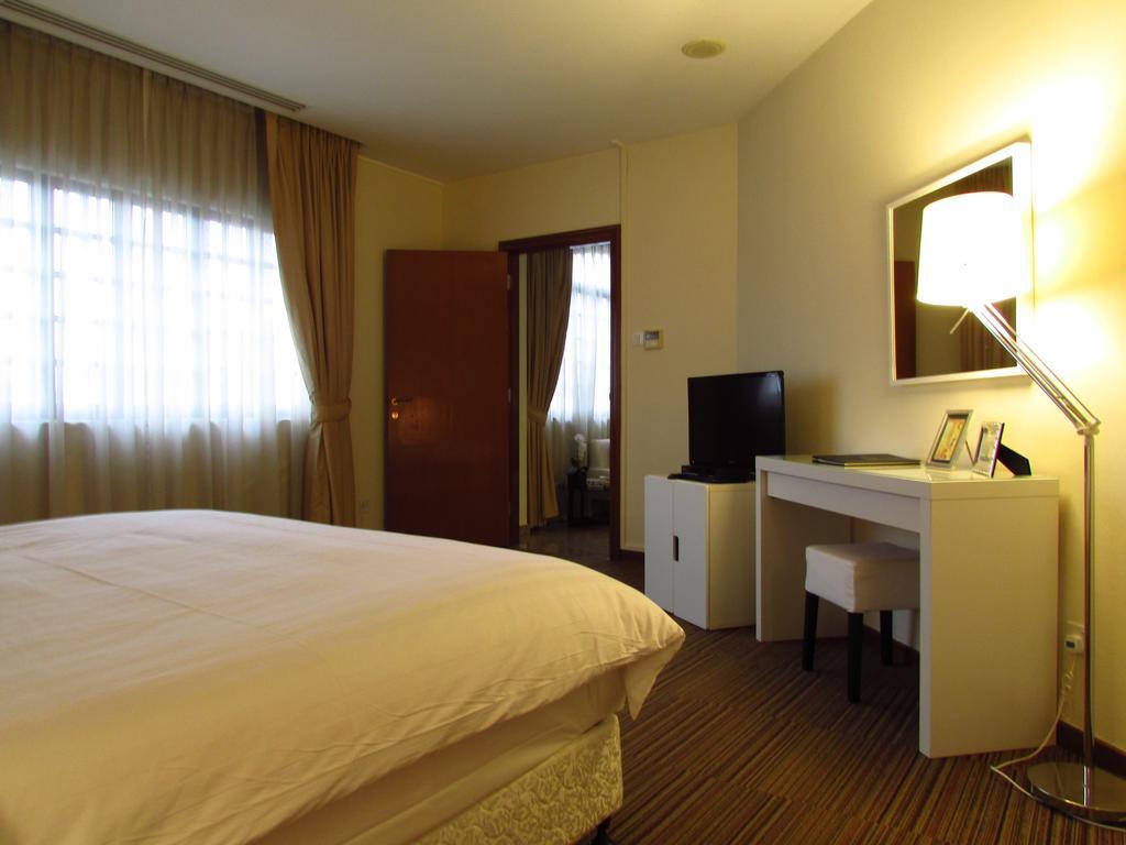 Alocassia Serviced Apartments Szingapúr Szoba fotó