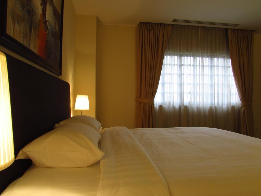 Alocassia Serviced Apartments Szingapúr Szoba fotó
