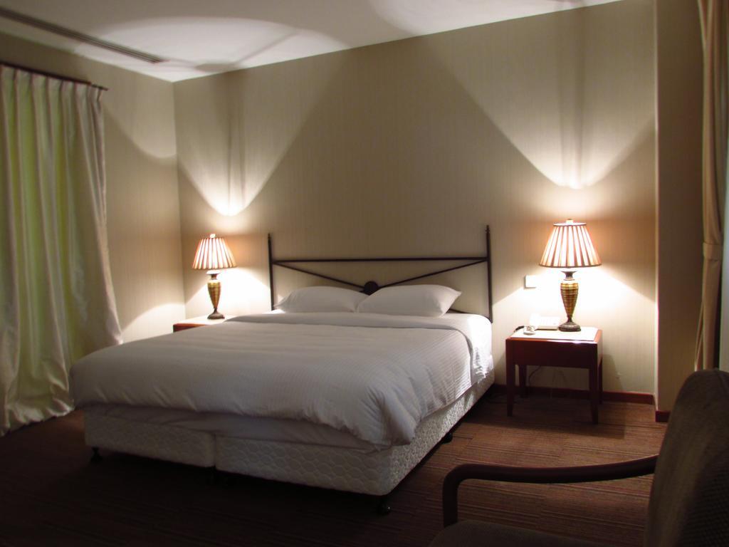 Alocassia Serviced Apartments Szingapúr Szoba fotó