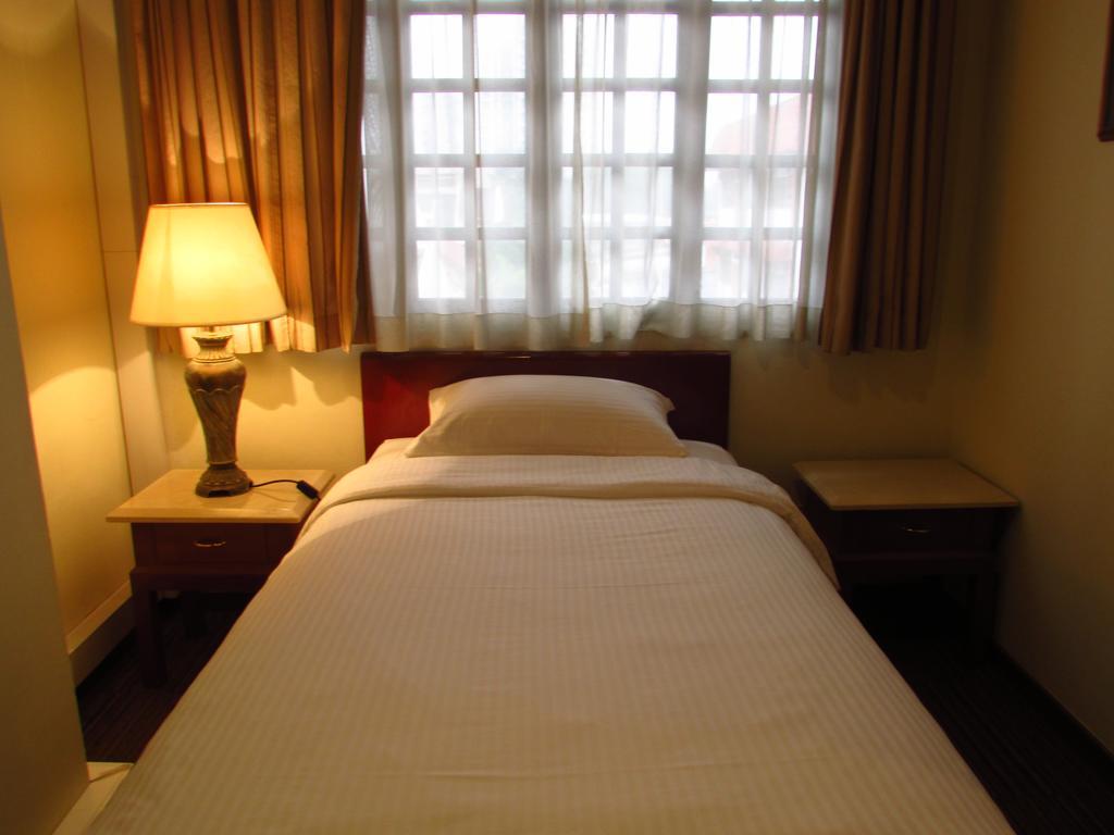 Alocassia Serviced Apartments Szingapúr Szoba fotó
