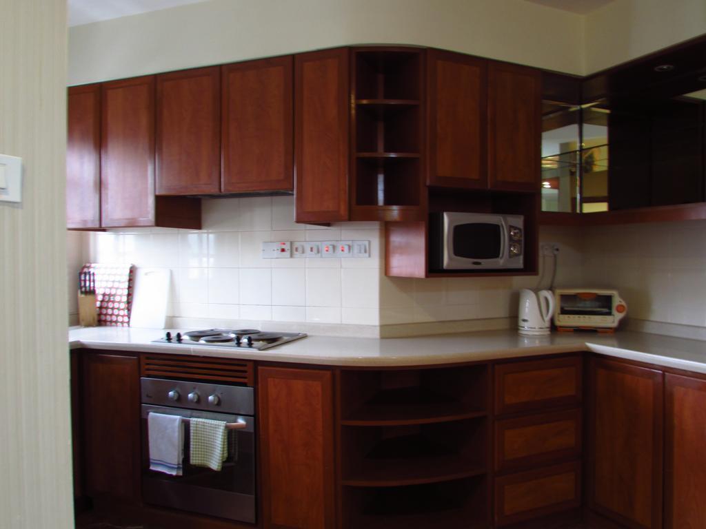 Alocassia Serviced Apartments Szingapúr Szoba fotó