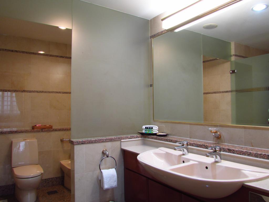 Alocassia Serviced Apartments Szingapúr Szoba fotó