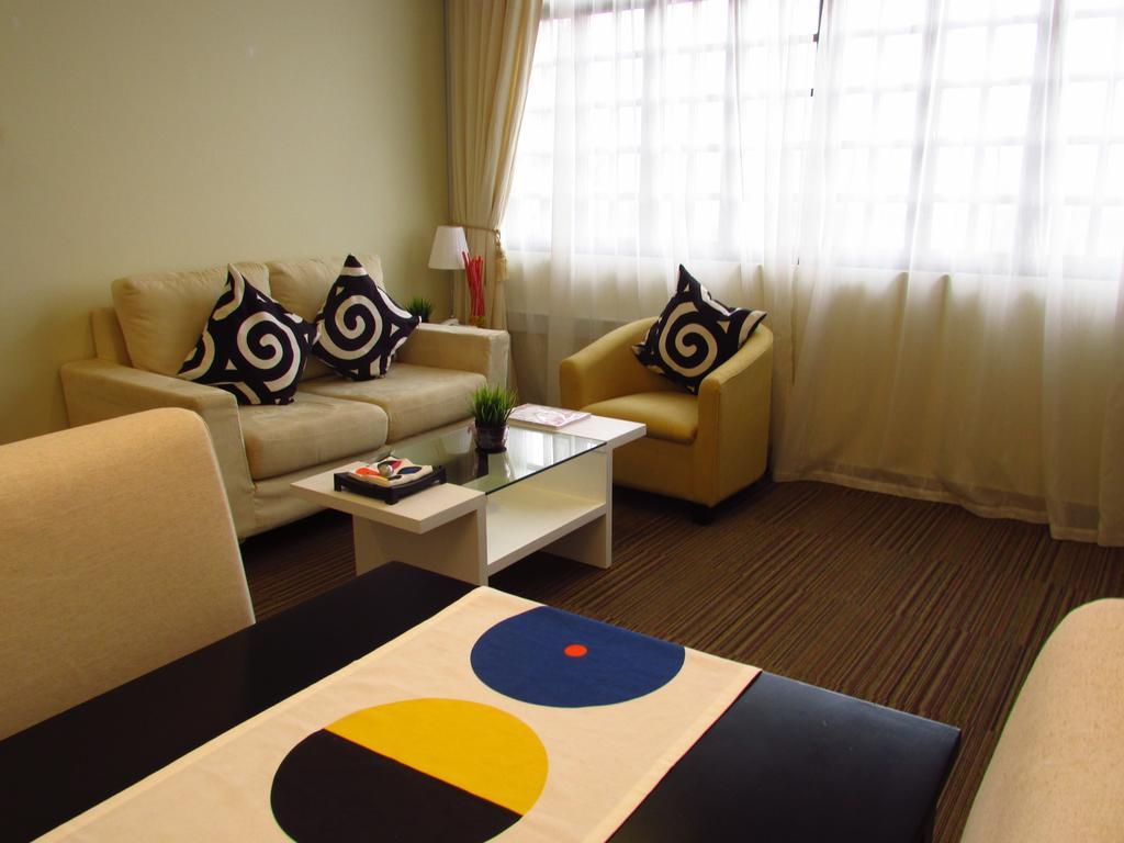Alocassia Serviced Apartments Szingapúr Szoba fotó