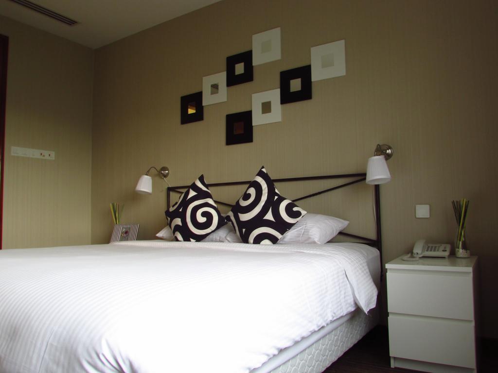 Alocassia Serviced Apartments Szingapúr Szoba fotó