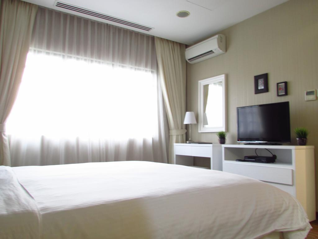 Alocassia Serviced Apartments Szingapúr Szoba fotó