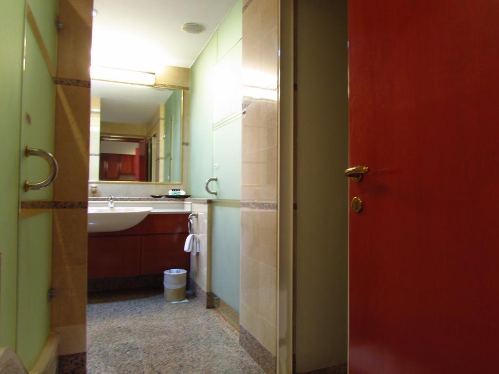 Alocassia Serviced Apartments Szingapúr Szoba fotó