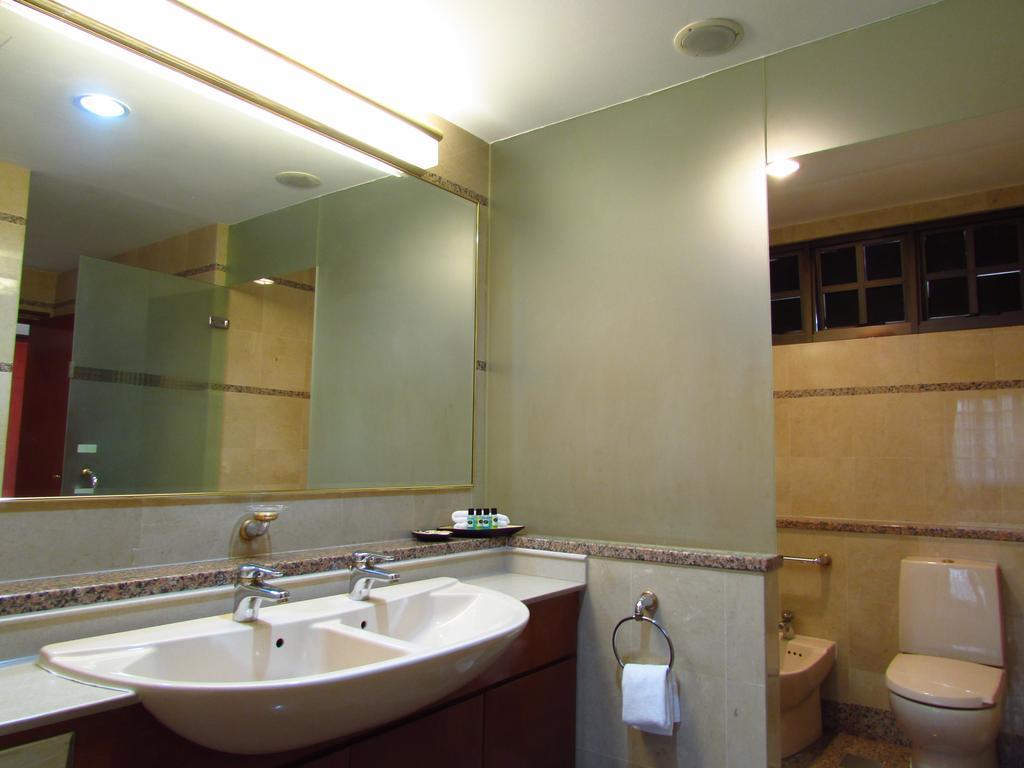 Alocassia Serviced Apartments Szingapúr Szoba fotó